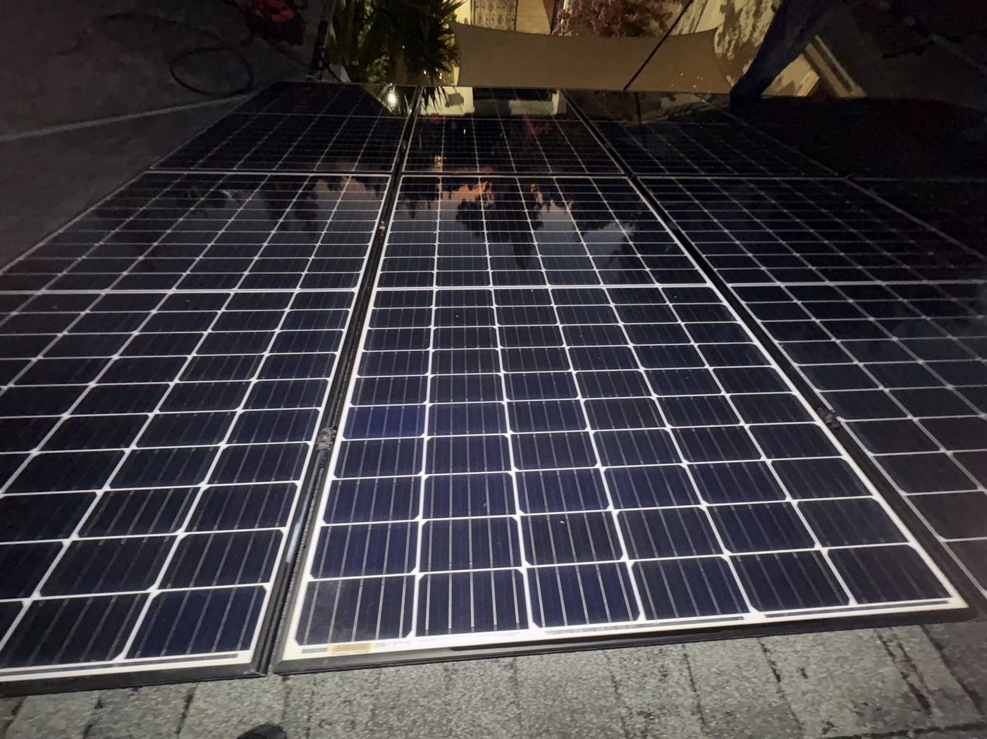 Close-up of a residential solar array cleaned to a streak-free, spot-free finish.
